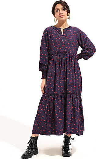 Navy, long, woven dress featuring a round neck with frill and short placket. It has an overall print in a refreshing shade of red along with straight sleeves with smocking opening. It also has cut and sew panels with frills. ...