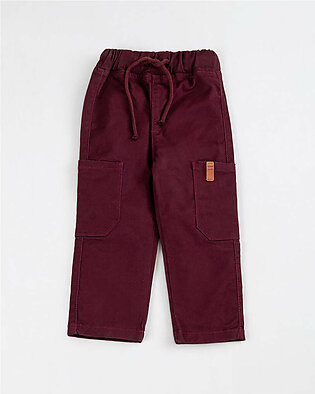 Design Details: Maroon Cargo Pants. Featuring an elasticated waistband with adjustable drawstrings, these twill pants offer a slim fit and come equipped with practical patch pockets on the legs and a back pocket. Fit Type: Slim Fit Fabric: Twill Occasion:...