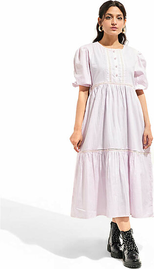 Light pink, long, woven dress with a round neck and a short button placket. It comes with a contrasting lace with pleats at the yoke. It also features elasticated short sleeves and cut and sew panels at the waist and...