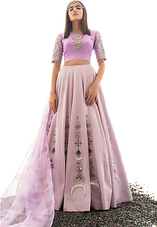 GET THE LOOK:Lilac colored Lehnga with celestial inspired embellishment using traditional materials. The croptop is made in a darker lilac tone with fully embroidered sleeves and a beautiful white Swarovski worked neckline. MATERIAL: Description Material  Croptop Satin silk Skirt Satin...