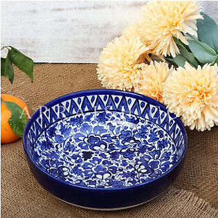 The Serina Blue bowl is a deep bowl that features blue undertone all around and intricate pattern. Hand glazed for an artisan made look. Hand crafted by the professional artisans of Multan. Material: Ceramic Hand-glazed and hand-painted. Sold as individually. ...