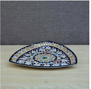 This dish features a deep blue intricate pattern all over it. And is made of ceramic by the hands of the skilled artisans of Multan. Produced in Multan. This dish can be used for BBQ, salads, and many more. Material: Ceramic...
