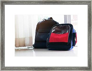 Back To School Concept. Blue  Backpack Lean On The Glass Door Fo Framed Print