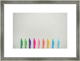 Brightly Colored Markers Lined On White Background Framed Print