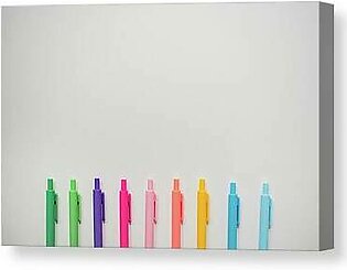 Brightly Colored Markers Lined On White Background Canvas Print