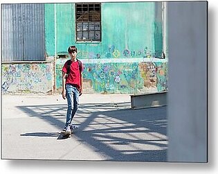 Full Length Of Student Skateboarding On Road In City During Sunny Day Metal Print